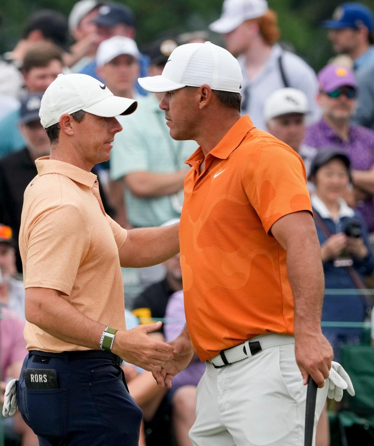 Apr 4, 2023; Augusta, Georgia, USA; Rory McIlroy and Brooks Koepka embrace on the ninth green during a practice round for The Masters golf tournament at Augusta National Golf Club. Mandatory Credit: Michael Madrid-USA TODAY Network

Pga The Masters Practice Round