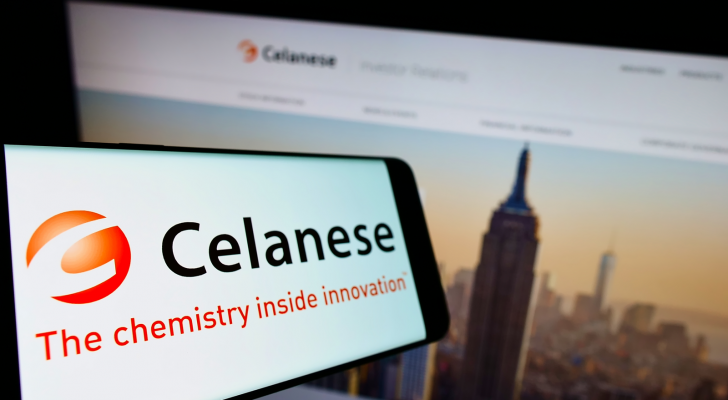 Cellphone with logo of US chemicals company Celanese Corporation (CE) on screen in front of business website Focus on center-left of phone display