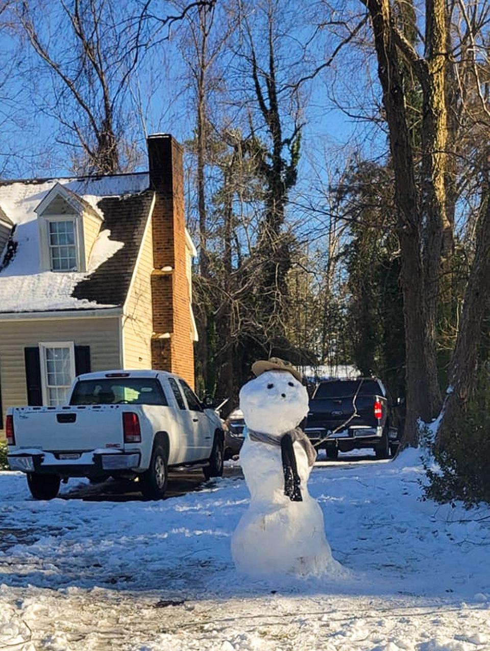 A snowman looks toward the road after last week's snowstorm. A new storm is forecast to bring 1 to 2 inches of snow to Kinston and Lenoir County by
Saturday morning.