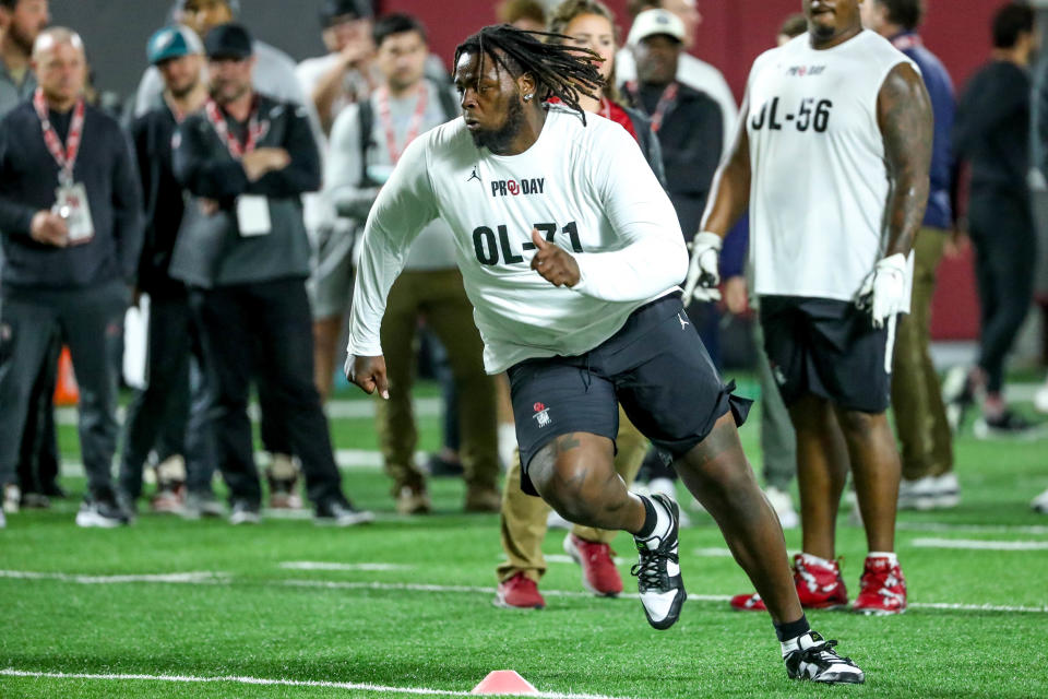 OU offensive lineman Anton Harrison runs drills during NFL Pro Day on Thursday at the Everest Training Center in Norman.