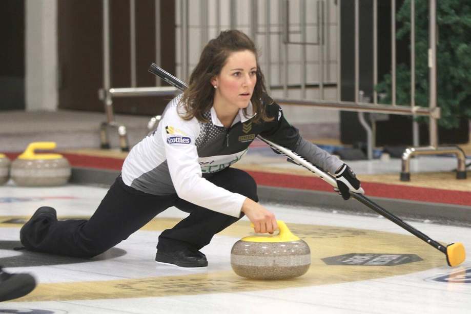 Picture of Aly Jenkins on the ice, during a curling competition, the sport which is popular in Canada.