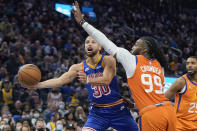 Golden State Warriors guard Stephen Curry (30) shoots against Phoenix Suns forward Jae Crowder (99) during the first half of an NBA basketball game in San Francisco, Friday, Dec. 3, 2021. (AP Photo/Jeff Chiu)