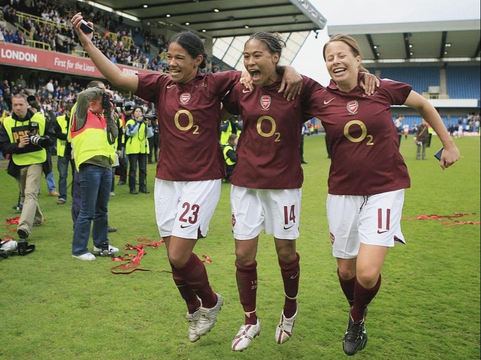 <p>Mary Phillip (left) celebrates winning the FA Cup with Arsenal in 2006</p>Getty Images