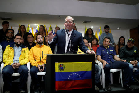 Juan Pablo Guanipa, member of the opposition party Justice First (Primero Justicia), talks to the media during a news conference in Caracas, Venezuela, February 21, 2018. REUTERS/Marco Bello