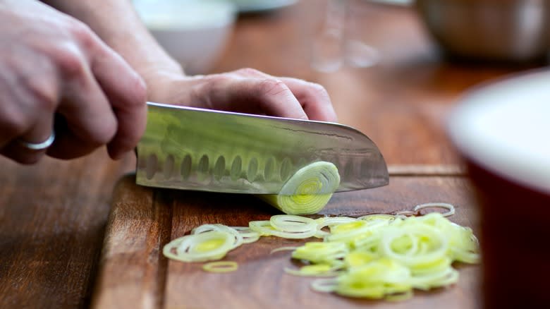 slicing leeks with chef's knife