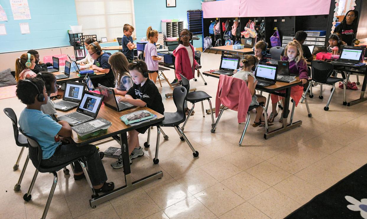 Anderson School District Threes Iva Elementary School In Iva S C
A second-grade writing class works on laptops at Anderson School District Three's Iva Elementary School, which now ranks in the top 16 percent of elementary schools in South Carolina. This is the school's highest rating in history. Credit: Ken Ruinard / staff)