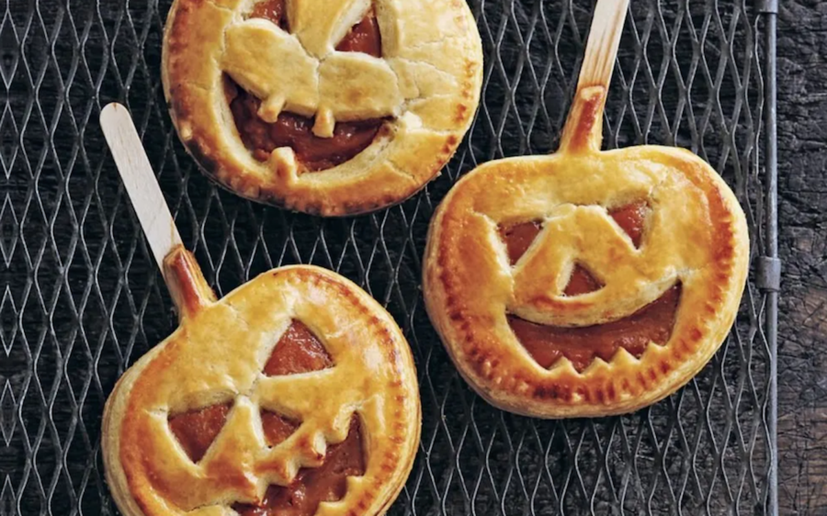 <p>Ryland Peters and Small</p><p>These pumpkin pie pops are a fun Halloween dessert to make with family or friends.</p><p><strong>Get the recipe: <em><a href="https://parade.com/1097273/parade/pumpkin-pie-pops-halloween-recipe/" rel="nofollow noopener" target="_blank" data-ylk="slk:Pumpkin Pie Pops;elm:context_link;itc:0;sec:content-canvas" class="link rapid-noclick-resp">Pumpkin Pie Pops</a></em></strong></p>