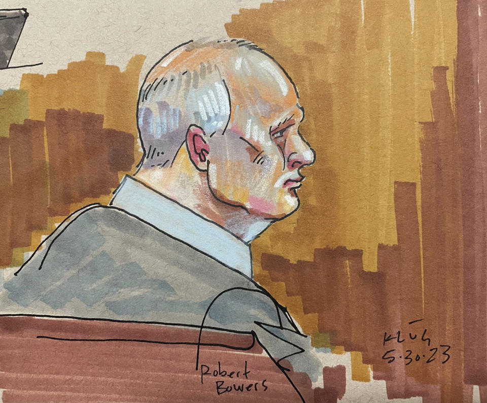 In this courtroom sketch, Robert Bowers, the suspect in the 2018 synagogue massacre, sits in court Tuesday, May 30, 2023, in Pittsburgh. Bowers could face the death penalty if convicted of some of the 63 counts he faces in the shootings, which claimed the lives of worshippers from three congregations who were sharing the building, Dor Hadash, New Light and Tree of Life. (David Klug via AP)