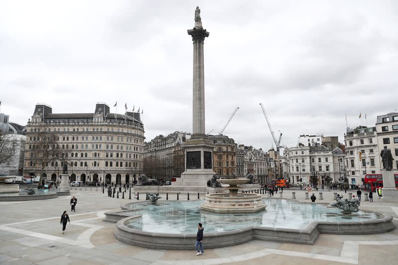 Trafalgar Square stands almost empty in London