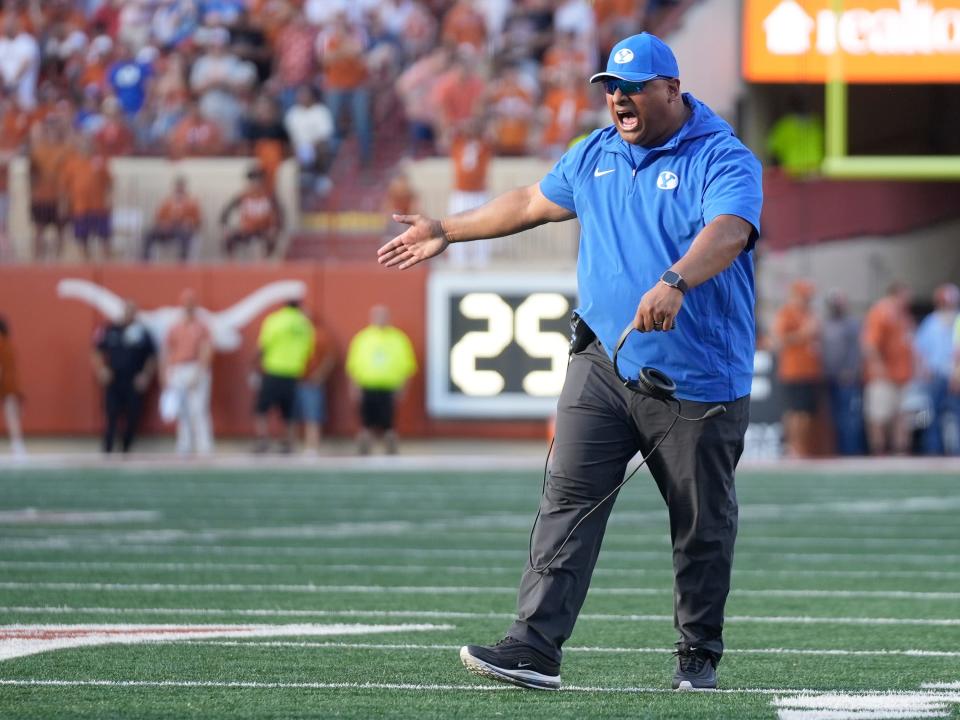 BYU Cougars head coach Kalani Sitake celebrates after the Cougars stopped the Texas Longhorns in the red zone in the fourth quarter at Royal-Memorial Stadium on Saturday October 28, 2023.