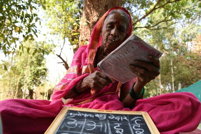 The Aajibaichi Shala, or "school for grannies" in a village in Maharashtra gives elderly women an education they were denied as children (AFP Photo/Indranil MUKHERJEE)