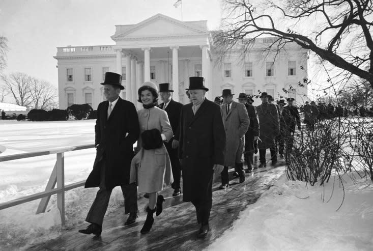 Not originally published in LIFE. John F. Kennedy, his wife Jackie and others walk to his inauguration, January 1961. (Paul Schutzer—Time & Life Pictures/Getty Images) <br> <br> <a href="http://life.time.com/history/life-at-the-inaugurations-rare-and-classic-photos-1933-1969/#1" rel="nofollow noopener" target="_blank" data-ylk="slk:Click here to see the full collection at LIFE.com;elm:context_link;itc:0;sec:content-canvas" class="link ">Click here to see the full collection at LIFE.com</a>