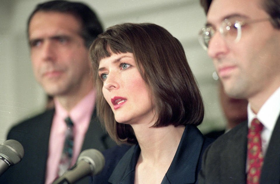 FILE - In this Dec. 10, 1992 file photo, flanked by her attorneys Frank Morocco, left, and Sheldon T. Zenner, right, Lawrencia Bembenek answers questions at a new conference in Chicago, Ill. The attorney for Wisconsin's famous runaway convict and convicted murderer Laurie 