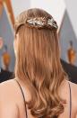 <i>The Danish Girl</i> actress revealed a diamond Chopard jewelled barrette in her hair and a pair of 18kt white gold earrings from Chopard's High Jewelry Collection.