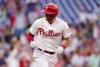 Philadelphia Phillies' Rhys Hoskins reacts after hitting a home run against Atlanta Braves pitcher Kyle Wright during the third inning of a baseball game, Wednesday, June 29, 2022, in Philadelphia. (AP Photo/Matt Slocum)