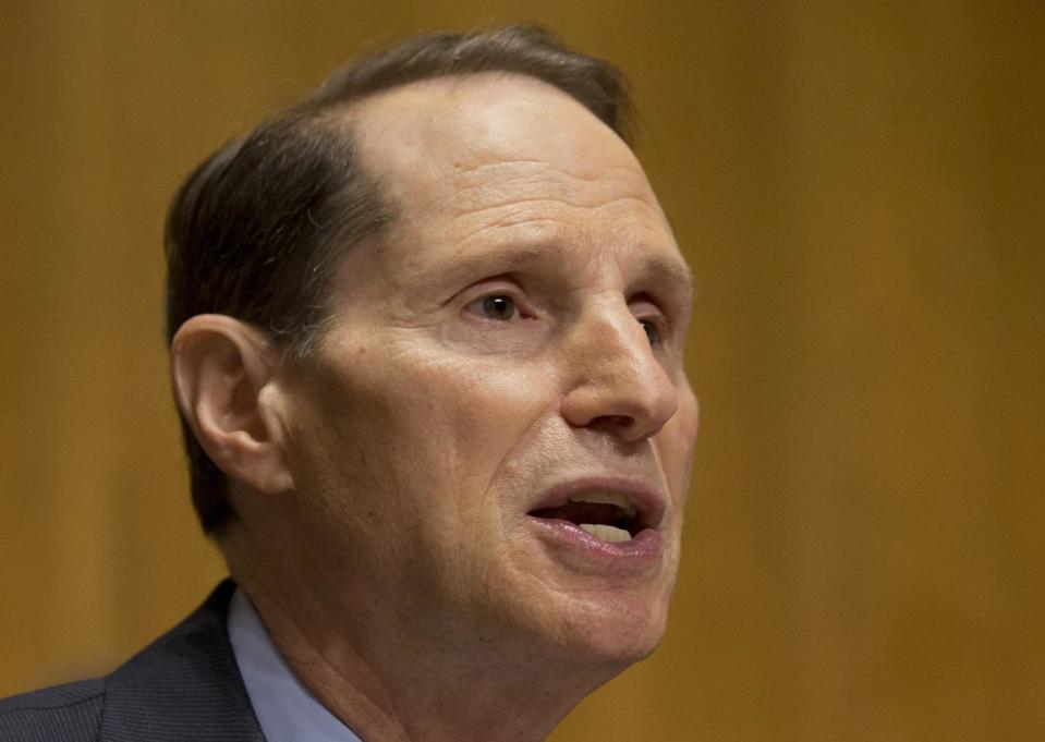 FILE - In this March 5, 2014, file photo, Senate Finance Committee Chairman Sen. Ron Wyden, D-Ore. speaks on Capitol Hill in Washington. The CIA does not give up its secrets easily. Under pressure from a Senate committee to declassify parts of a congressional report on harsh interrogations of suspected terrorists, the CIA is shadowed by its reluctance to open up about its operations and its past. The CIA officials who decide which secrets can be revealed have wrestled with Congress, archivists, journalists, former CIA employees and even a former CIA director. Wyden said he worries the CIA is playing "stall ball," deliberately drawing out the declassification process. (AP Photo/Jacquelyn Martin, File)