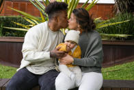 Ellia Green with his partner Vanessa Turnbull-Roberts and their daughter Waitui are pictured in Sydney, Australia, Monday, Aug. 15, 2022. Green, one of the stars of Australia's gold medal-winning women's rugby sevens team at the 2016 Olympics, has transitioned to male. The 29-year-old, Fiji-born Green is going public in a video at an international summit aimed at ending transphobia and homophobia in sport. The summit is being hosted in Ottawa as part of the Bingham Cup rugby tournament. (AP Photo/Mark Baker)