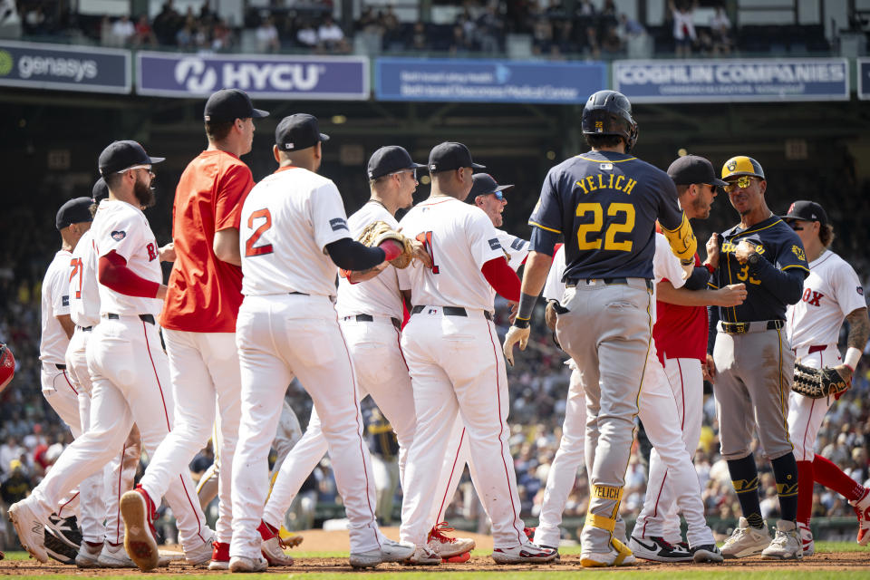 BOSTON, MA - MAY 26:  Quintin Berry #33 of the Milwaukee Brewers reacts with pitching coach Andrew Bailey of the Boston Red Sox as the benches clear during the seventh inning of a game on May 26, 2024 at Fenway Park in Boston, Massachusetts. (Photo by Maddie Malhotra/Boston Red Sox/Getty Images)