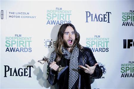 Actor Jared Leto holds his Best Supporting Male award after winning for " of Dallas Buyers Club," backstage at the 2014 Film Independent Spirit Awards in Santa Monica, California March 1, 2014. REUTERS/Danny Moloshok