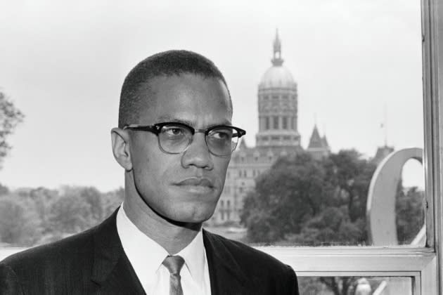 Malcolm X in Front Of Connecticut Capitol Building - Credit: Bettmann Archive