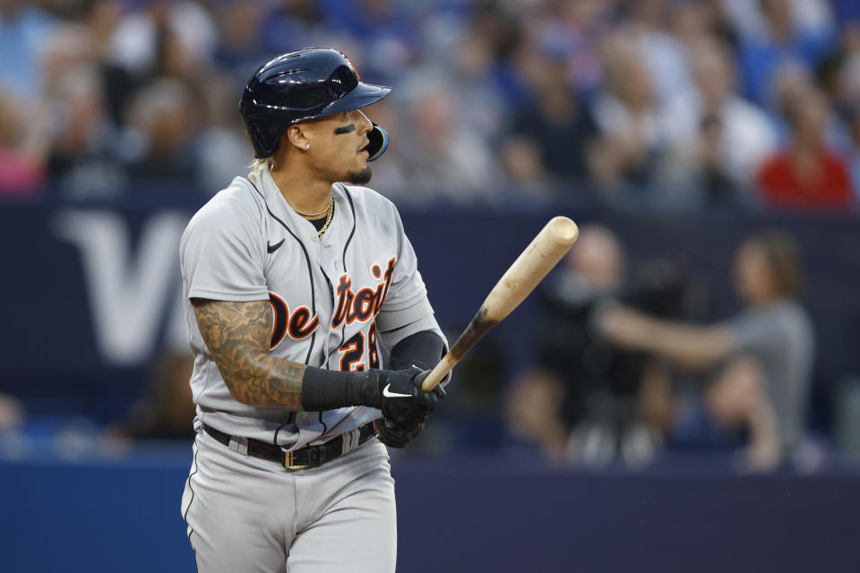 Detroit Tigers' Javier Baez (28) watches his double against the Toronto Blue Jays in second-inning baseball game action in Toronto, Thursday, April 13, 2023. (Cole Burston/The Canadian Press via AP)
