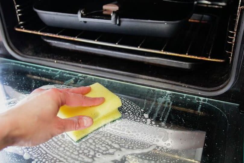 Scrubbing the oven