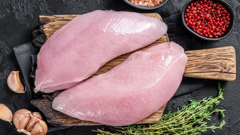 two raw turkey breasts