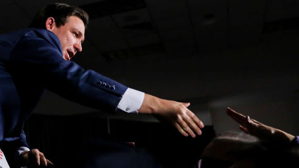 Florida Gov. Ron DeSantis greets supporters at his Iowa caucus watch party in West Des Moines on Monday. - Alyssa Pointer/Reuters