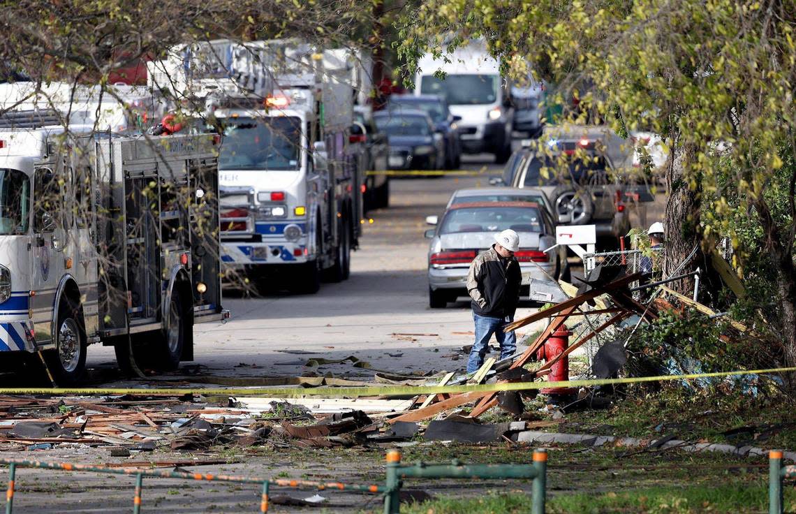 The scene where a house exploded on Watters Place in the Westworth Village is investigated on Dec. 1, 2022.