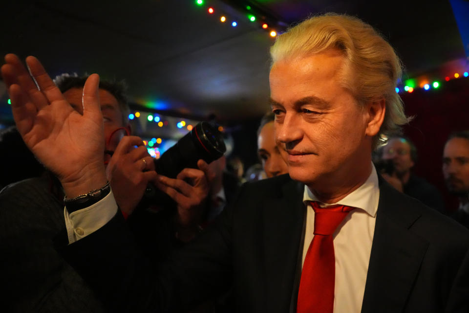 SCHEVENINGEN, NETHERLANDS - NOVEMBER 22: Geert Wilders (C), Dutch right-wing politician and leader of the Party for Freedom (PVV), reacts to the exit poll and early results that strongly indicate a victory for his party in the Dutch elections on November 22, 2023 in Scheveningen, Netherlands. Dutch voters have gone to the polls today in one of the most tightly contested general elections in recent years. (Photo by Carl Court/Getty Images).