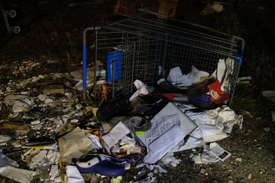 A shopping cart is overturned outside a homeless encampment off Washington Road during Augusta&#39;s homeless survey on Wednesday, Feb. 23, 2022. Volunteers helped register homeless individuals and handed out supplies such as toiletries, hats, blankets and resource information.