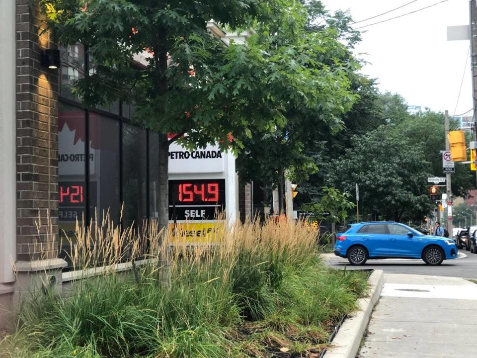 The price of gas in Toronto currently sits at $1.54.9 per litre — the lowest price since last winter and well below June's high of $2.16 per litre.  (Clara Pasieka/CBC - image credit)