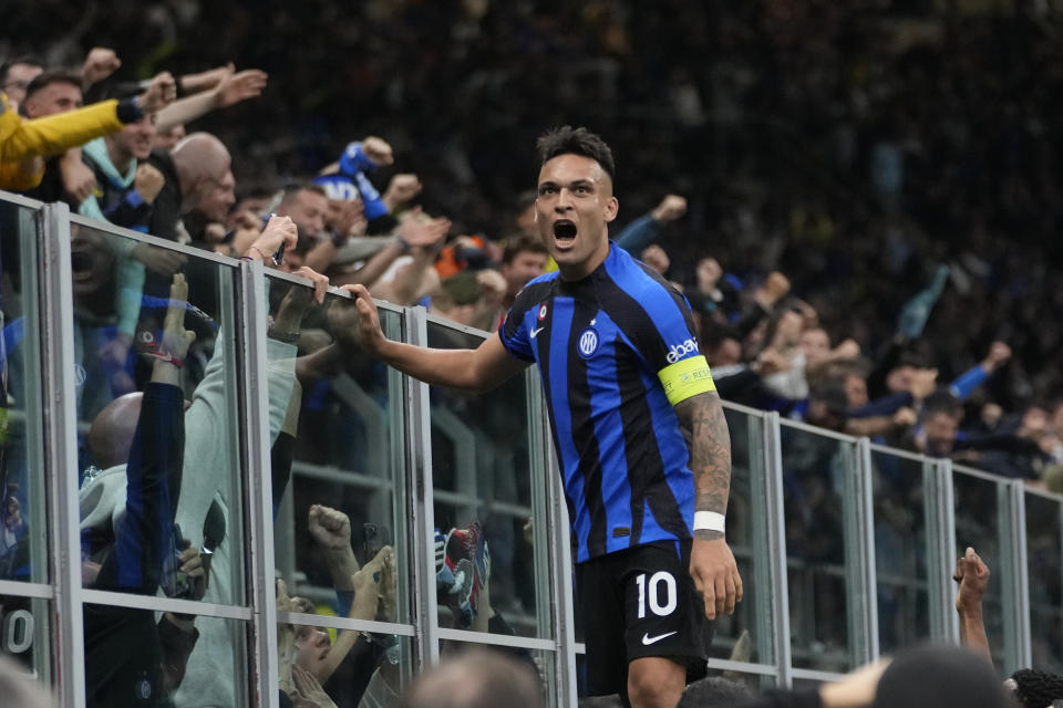 Inter Milan's Lautaro Martinez celebrates after scoring his side's opening goal during the Champions League semifinal second leg soccer match between Inter Milan and AC Milan at the San Siro stadium in Milan, Italy, Tuesday, May 16, 2023. (AP Photo/Luca Bruno)