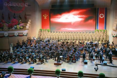 People perform for North Korean leader Kim Jong Un during a celebration for nuclear scientists and engineers who contributed to a hydrogen bomb test, in this undated photo released by North Korea's Korean Central News Agency (KCNA) in Pyongyang on September 10, 2017. KCNA via REUTERS