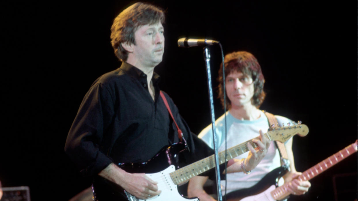  Rock and roll guitarists Eric Clapton and Jeff Beck perform onstage at the ARMS Charity Concert at the Royal Albert Concert Hall in September 1983 in London, England.  