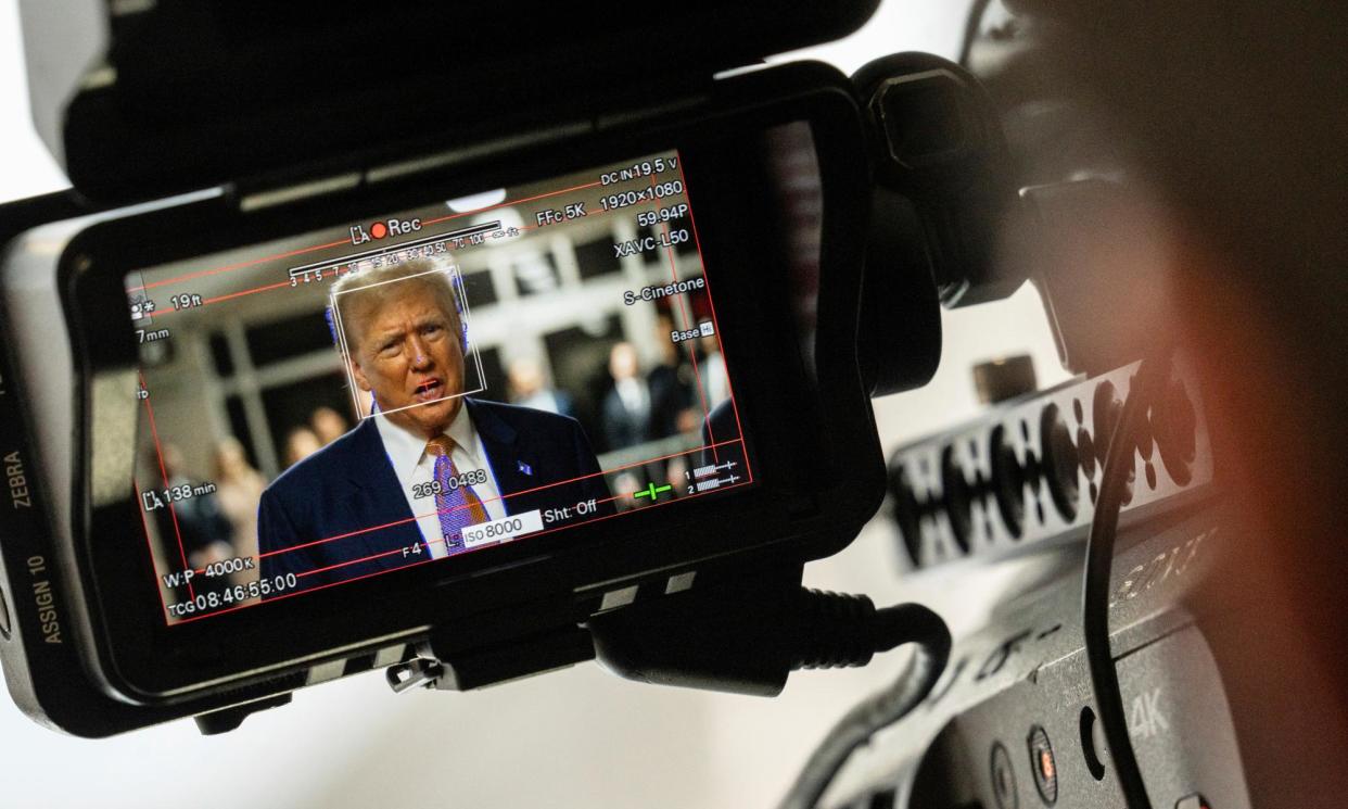 <span>Former president Donald Trump, seen through a camera viewfinder, speaks to members of the media. Newspapers across the world have been reacting to his guilty verdict.</span><span>Photograph: Jeenah Moon/AP</span>