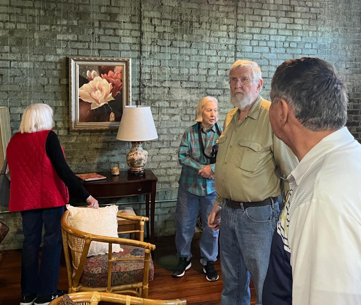Mike Morford, middle, invited members of the Wichita County Historical Commission on April 4, 2024, to tour the Scott Avenue business building he converted into a home.