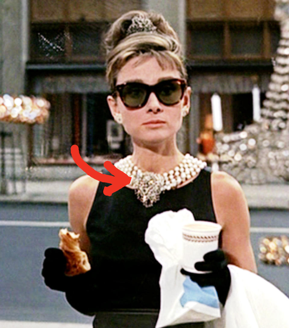 Audrey Hepburn wearing the yellow diamond necklace in "Breakfast at Tiffany's"