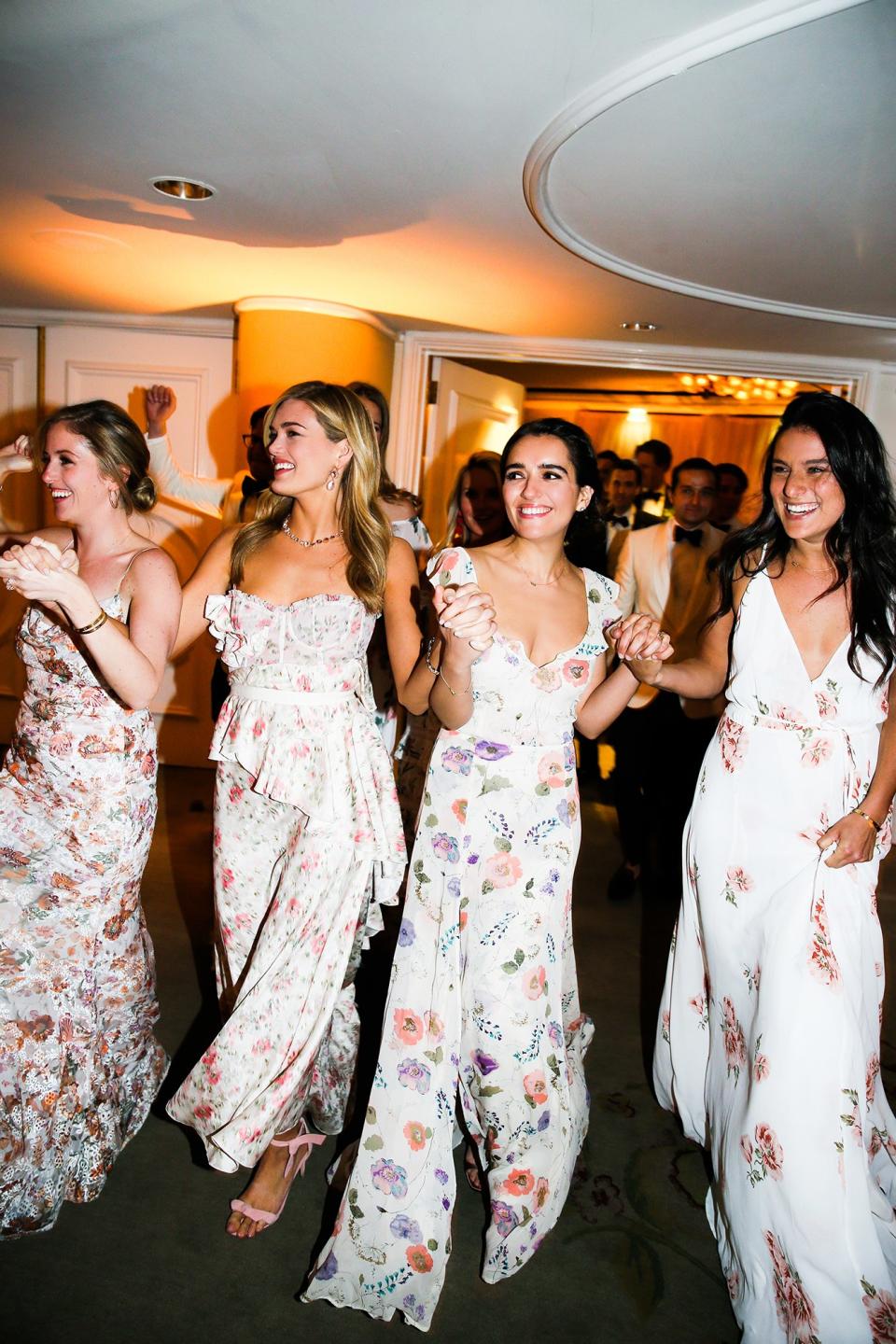 The bride wore Oscar de la Renta, inspired by her grandmother, for her greenery-filled ceremony at the Beverly Hills Hotel.