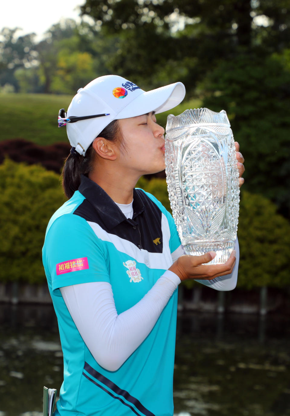 WILLIAMSBURG, VA - MAY 23: Wei-Ling Hsu of Chinese Taipei kisses the championship trophy after winning the Pure Silk Championship presented by Visit Williamsburg on the River Course at Kingsmill Resort on May 23, 2021 in Williamsburg, Virginia. (Photo by Hunter Martin/Getty Images)