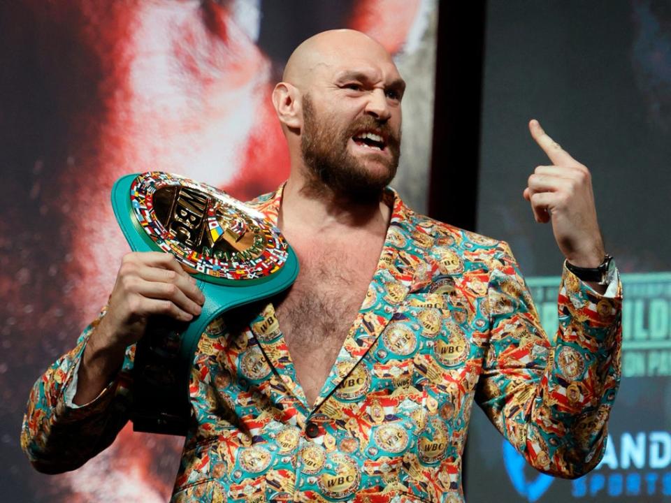 WBC heavyweight champion Tyson Fury gestures during the final news conference (Getty)