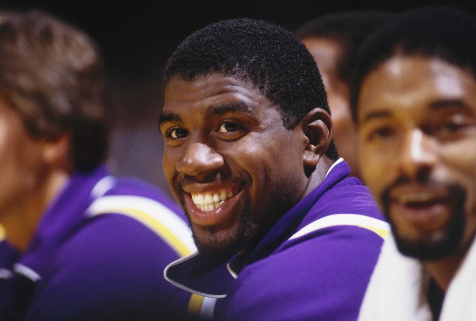 <p>Earvin "Magic" Johnson joined the Los Angeles Lakers for the 1979-1980 season after they drafted him first overall in the NBA Draft. Johnson played 13 seasons for the Lakers. He won league MVP three times, played in nine NBA finals, and was a member of five championship Lakers teams in the '80s.</p> <p>In 1991, Johnson announced that he is HIV-positive. Though he faced a lot of discrimination from other NBA players because of the news, the news was also essential to helping get rid of the stigma that HIV/AIDS only affects gay people. To this day, Johnson remains a vocal advocate for HIV/AIDS patients and research.</p>