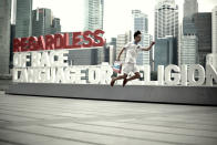 A man levitates over Singapore's Marina Bay. The duo behind the stunt claim there is no camera tricky involved (Levitation SG/ Rex Features)