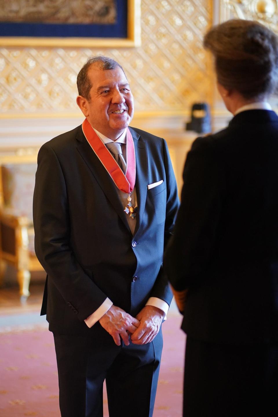 Ivor Bolton, from London, Conductor, is made a Commander of the Order of the British Empire by the Princess Royal at Windsor Castle (PA)