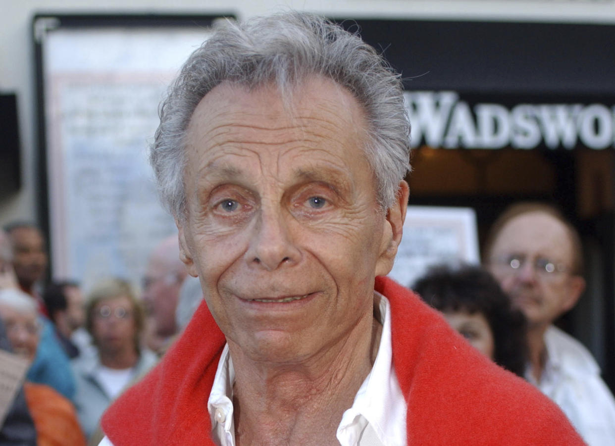FILE - Comedian Mort Sahl poses for photographs at the 80th Birthday "Sahl-ute" honoring him, in Los Angeles on June 28, 2007. Sahl, who helped revolutionize stand-up comedy during the Cold War with his running commentary on politicians and current events died Tuesday, Oct. 26. 2021. He was 94. His friend Lucy Mercer said that he died "peacefully" at his home in Mill Valley, Calif. (AP Photo/Ann Johansson, File)