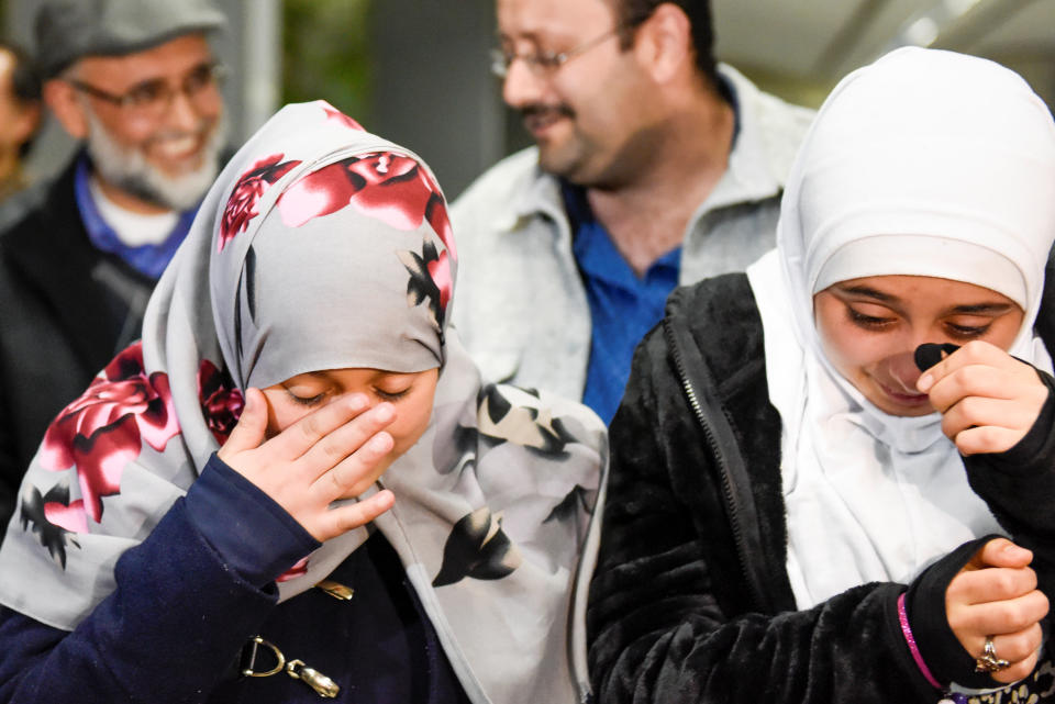 Eman Ali of Yemen, 12, cries with her sister Salma Ali after they meet&nbsp;for the first time in years at San Francisco International Airport in San Francisco, California, Feb. 5, 2017. The 12-year-old and her father were blocked entry into the United States because of the order.&nbsp;