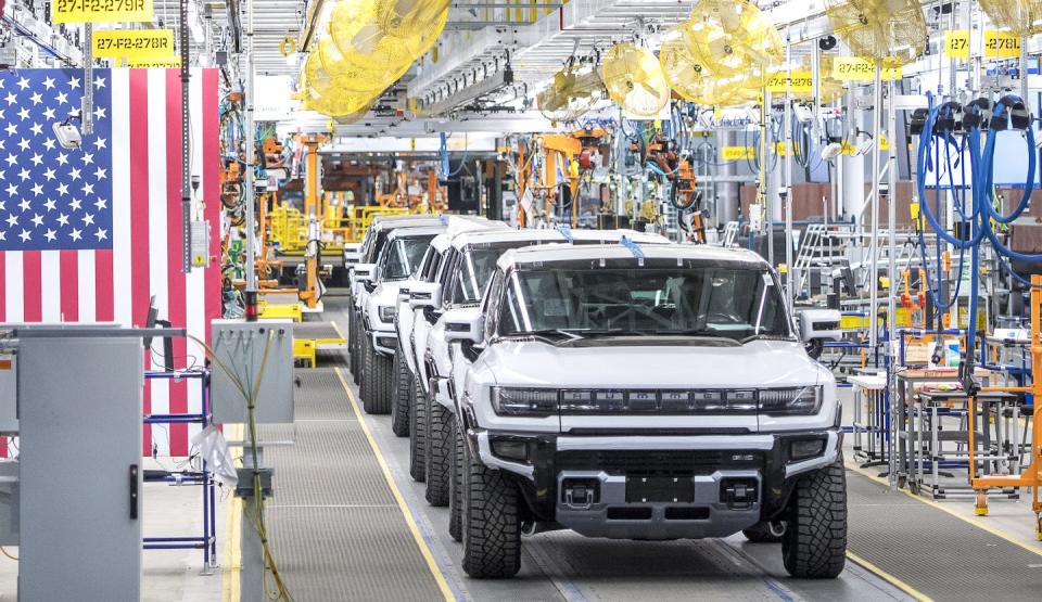 Automaker GMC shows off its Hummer EVs at a plant in Detroit. <a href="https://www.gettyimages.com/detail/news-photo/general-view-of-gmc-hummer-evs-is-pictured-on-november-17-news-photo/1236626057" rel="nofollow noopener" target="_blank" data-ylk="slk:Nic Antaya/Getty Images;elm:context_link;itc:0;sec:content-canvas" class="link ">Nic Antaya/Getty Images</a>