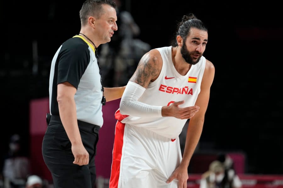 Spain’s Ricky Rubio, right, questions a call during a men’s basketball preliminary round game against Argentina at the 2020 Summer Olympics, Thursday, July 29, 2021, in Saitama, Japan. (AP Photo/Eric Gay)