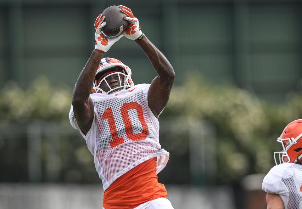 Clemson wide receiver Joseph Ngata (10) catches a ball during practice in Clemson Friday, August 12, 2022. 