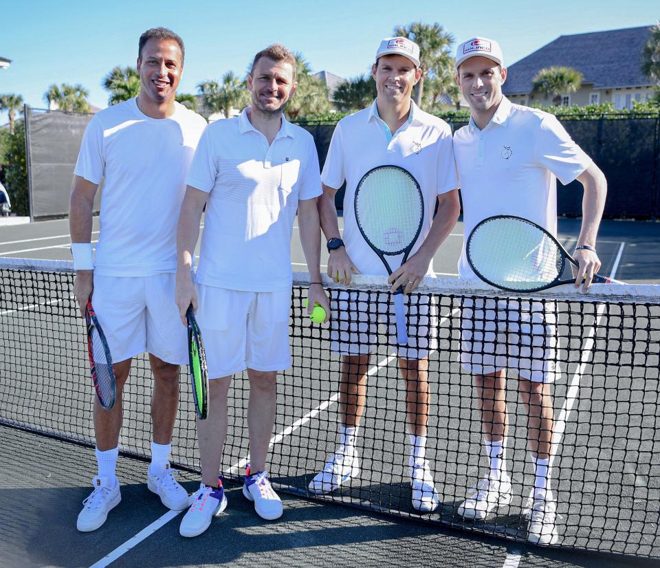 Thomas Blake (from left), Mardy Fish, Bob and Mike and Bryan take a photo after an exhibition at the Windsor Club in Indian River County on Saturday, Jan. 15, 2022.